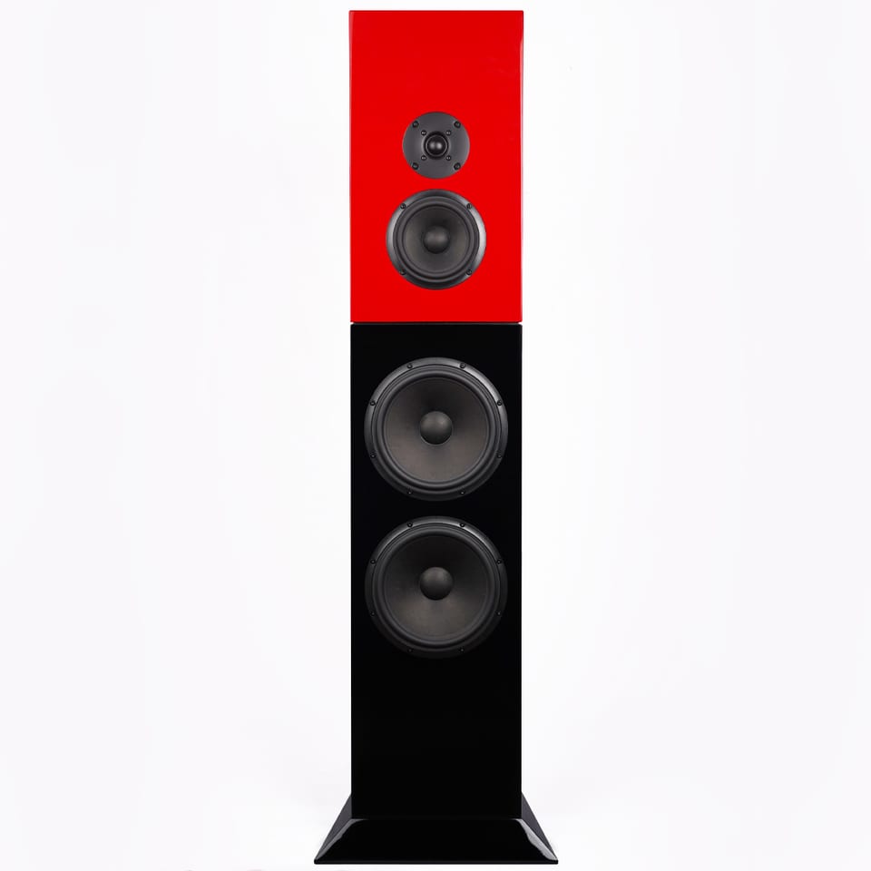 Tifa 8 floorstander straight on: a red gloss upper module carrying a 26 mm fabric dome and a midrange above a black gloss body with two 8-inch woofers, standing on a splayed black plinth.